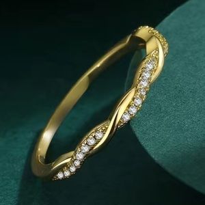 14k Gold Twist White Zirconia Ring